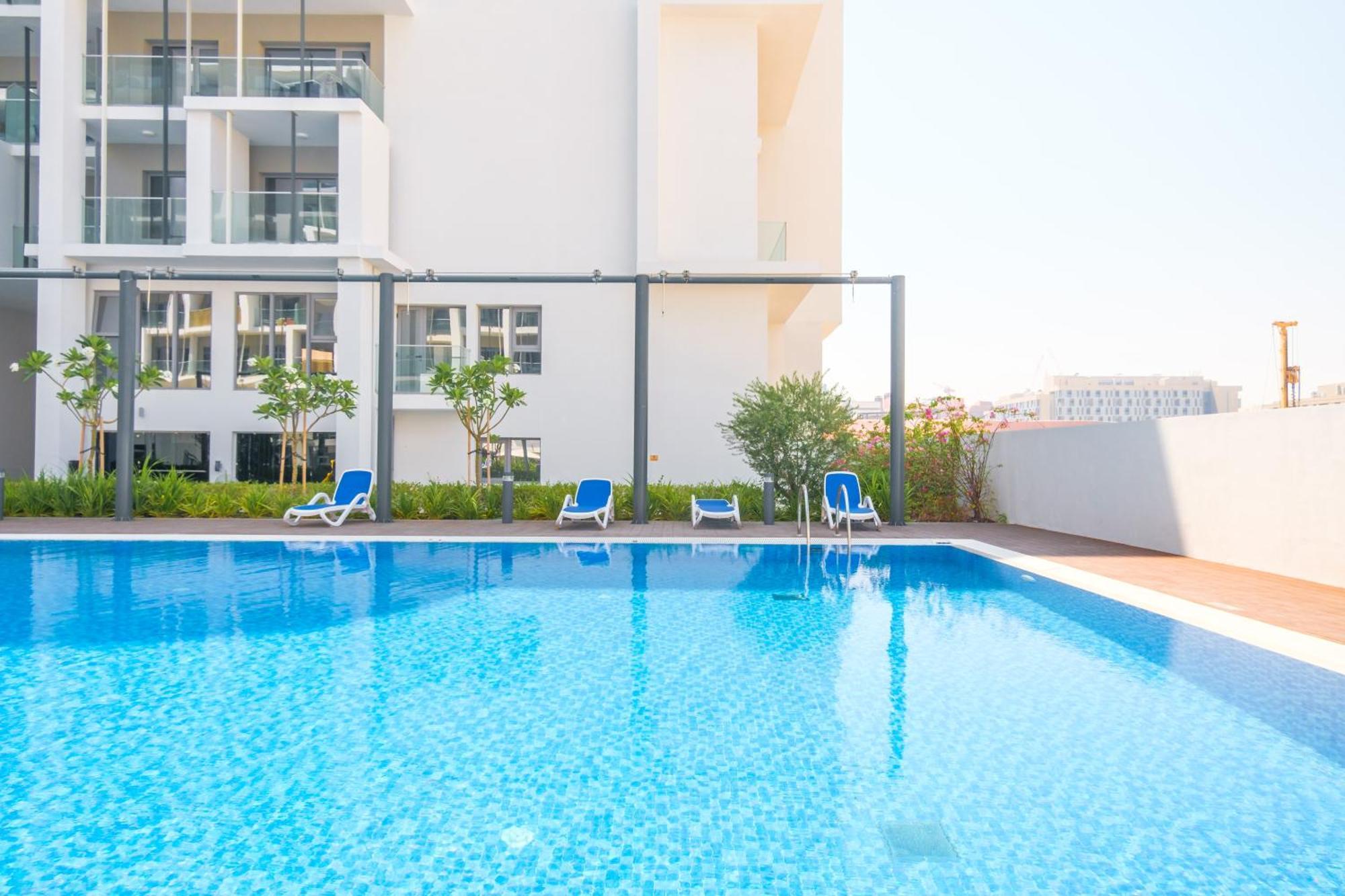 شقة Poolside Charm أبو ظبي المظهر الخارجي الصورة